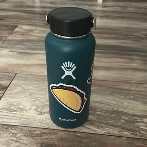 Jade Hydroflask with stickers